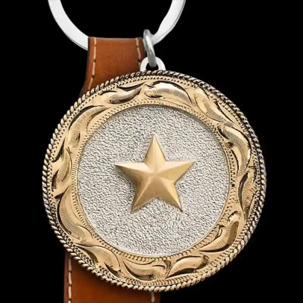 "The Old Way Custom Keychain is handcrafted on a German Silver base, featuring a stippled background that highlights the Jeweler's Bronze figure. It includes a hand-engraved outer border and a traditional rope edge. Customize this keychain with your 